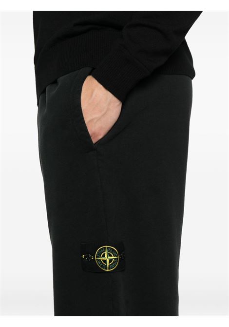 pantalone brushed organic cotton fleece uomo nero STONE ISLAND | K2S15 6200004 S0A20V0029